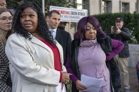 Defamed Georgia election workers ask court to give them control .